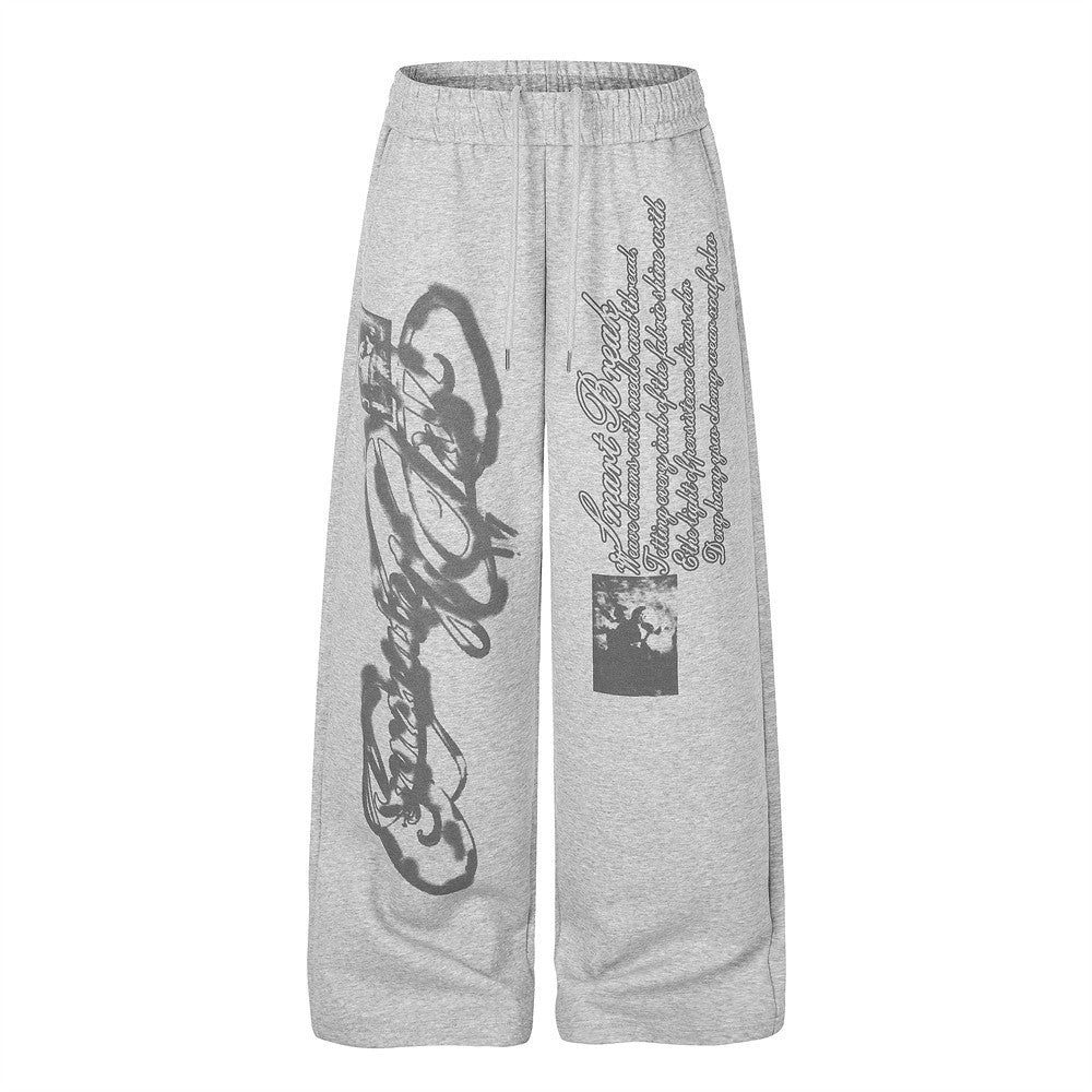 Heather grey wide-leg sweatpants with graffiti script and vintage photo collage prints, front and back view