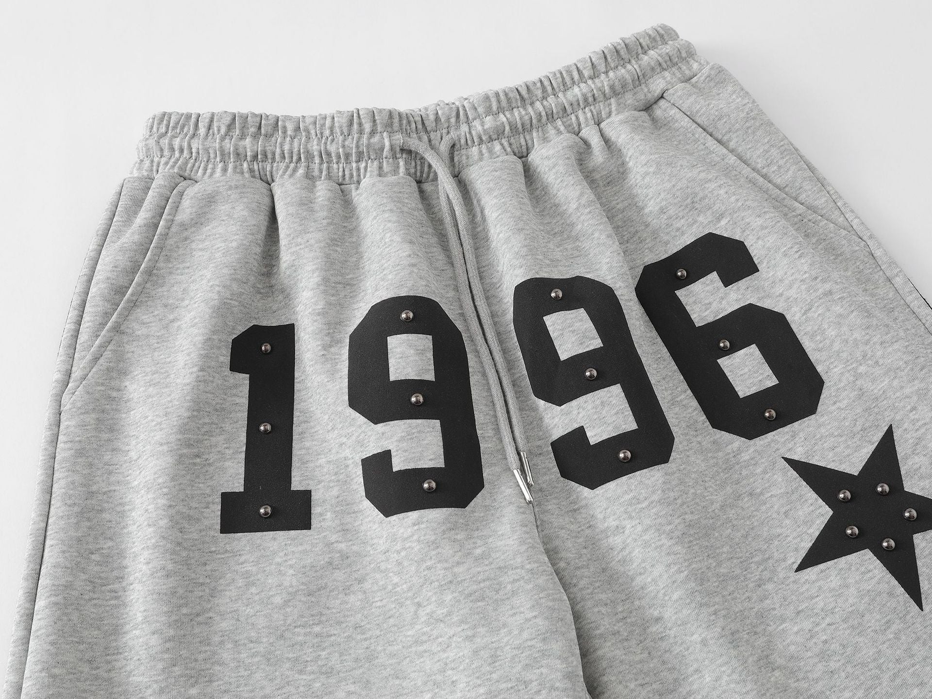 Pantalon de survêtement à jambes larges clouté d’étoiles 1996 avec détail à trois bandes