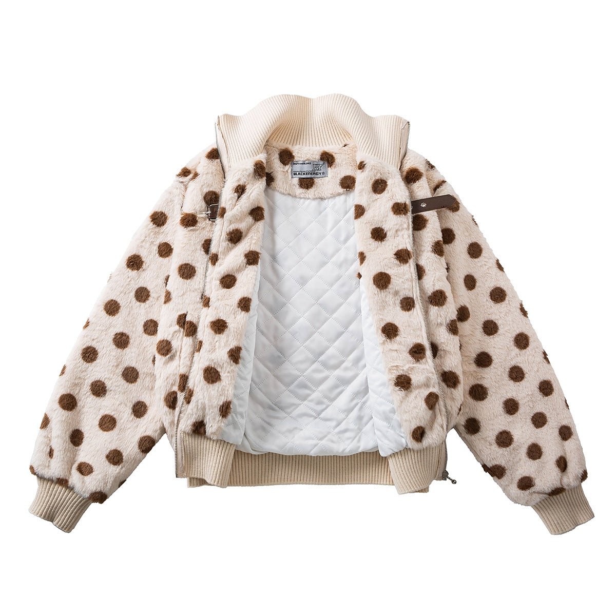 Open cream faux shearling bomber jacket showing its white quilted lining, ribbed trim, and brown polka dots