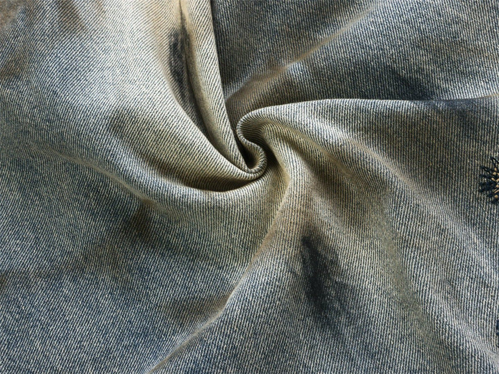 Baggy Wide-Leg Jeans – Chaotic Embroidery, Distressed Denim & Arc-Hem Design