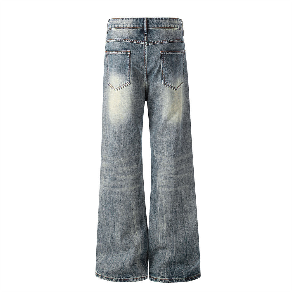 Vintage Washed Wide-Leg Flare Jeans – Distressed Faded Denim with Crease Detail
