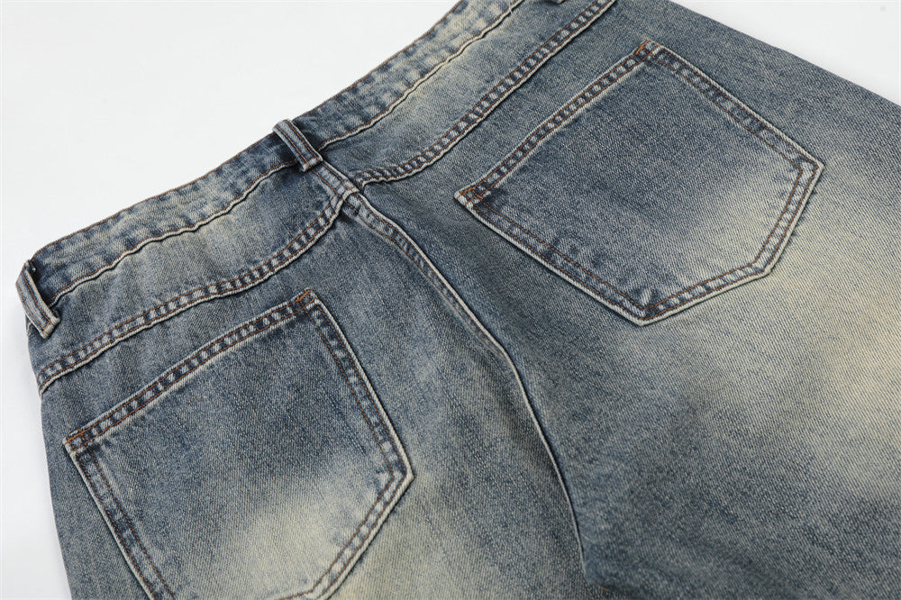 Vintage Washed Wide-Leg Flare Jeans – Distressed Faded Denim with Crease Detail