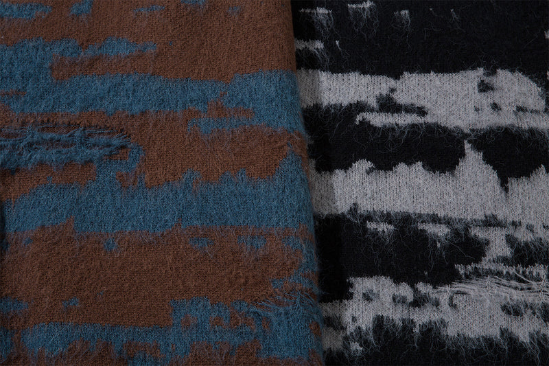 Close-up comparison of brown-blue and black-gray distressed stripe jacquard knit sweater patterns