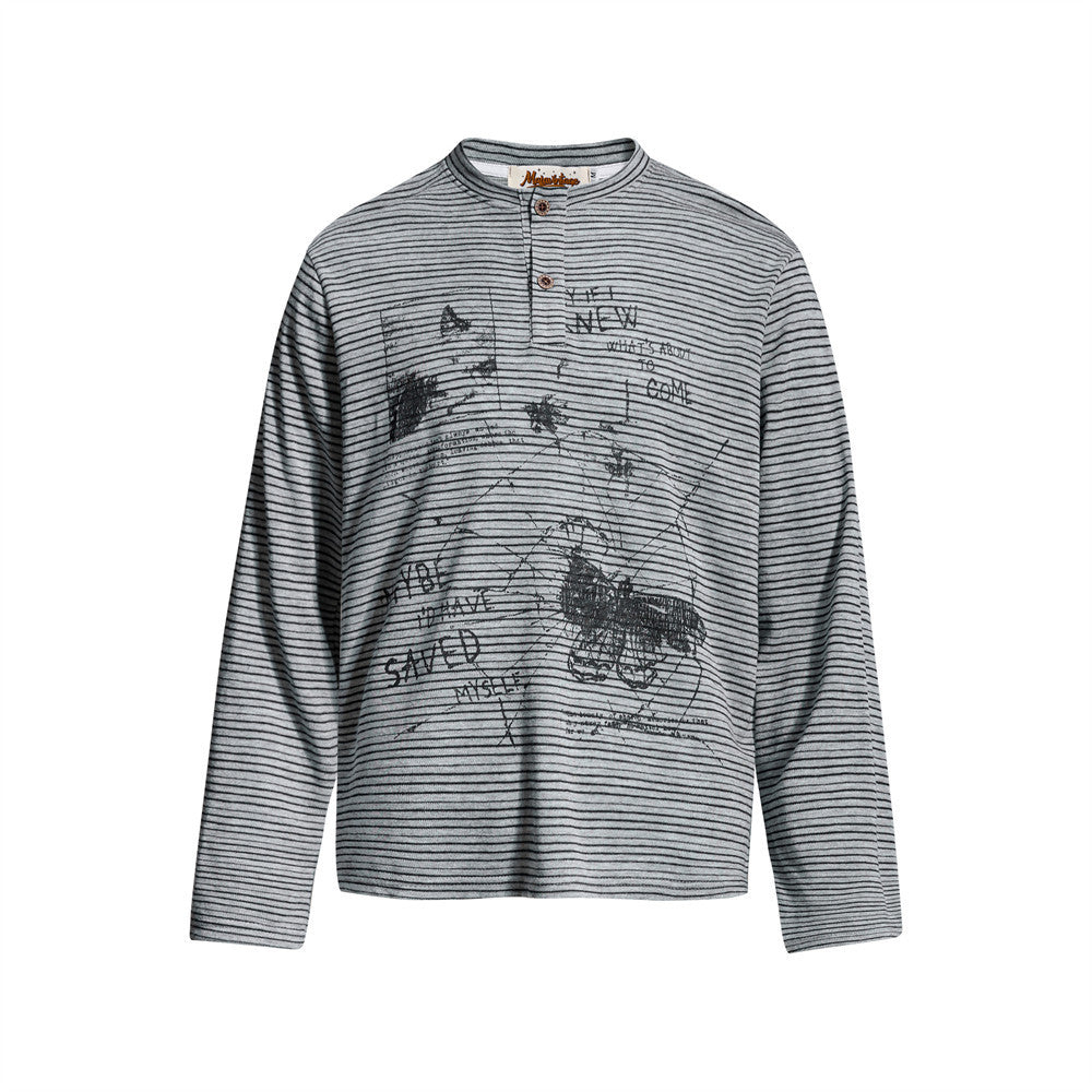 Men's grey striped long sleeve Henley shirt with abstract butterfly and hand-written text graphic print on the chest