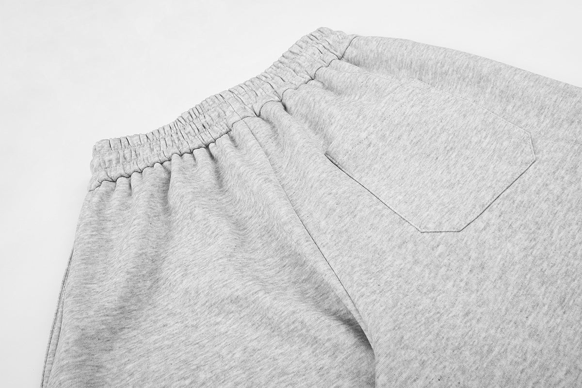 Streetwear-Jogginghose mit weitem Bein, Grafikprint & Seitenstreifen