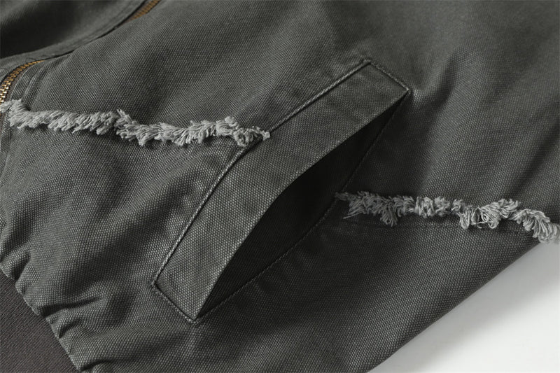Blouson bomber déconstruit en toile à coutures effilochées et zip diagonal