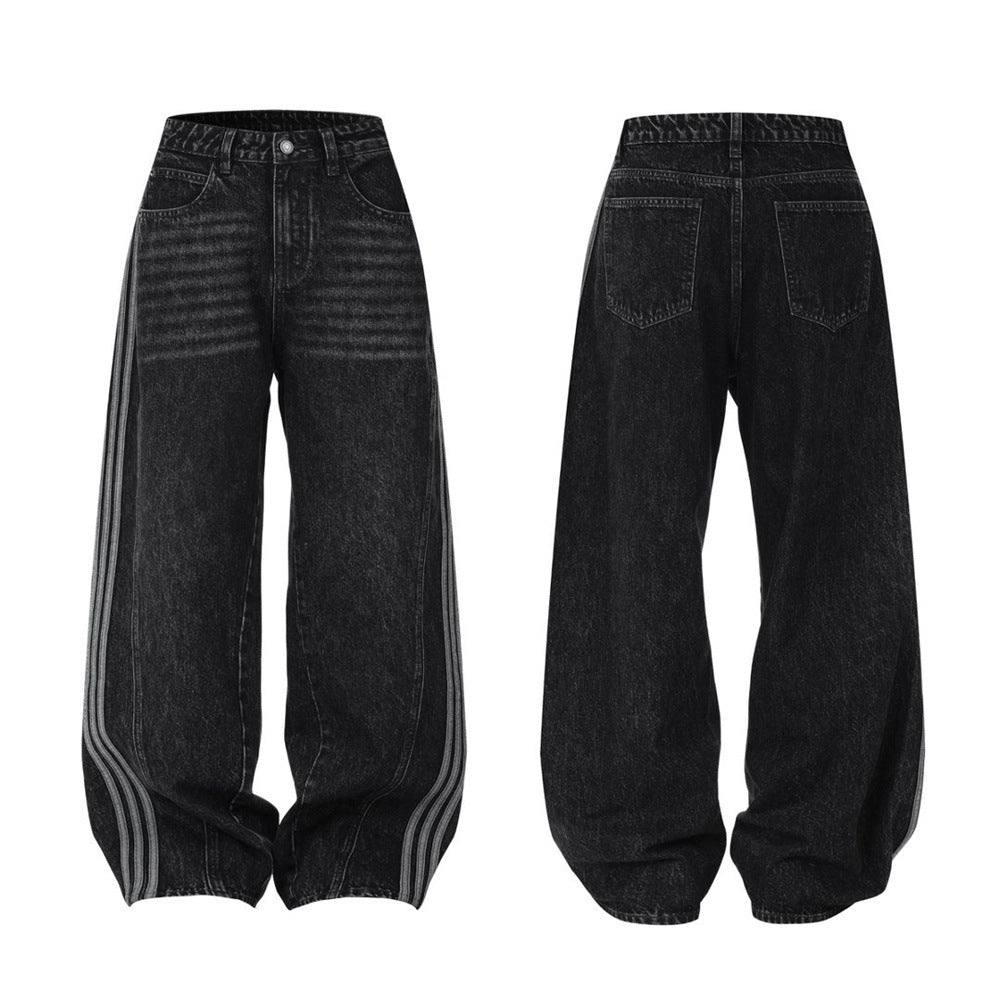 Washed black wide-leg dad jeans with triple contrast stripe tape along outer seams, front and back view