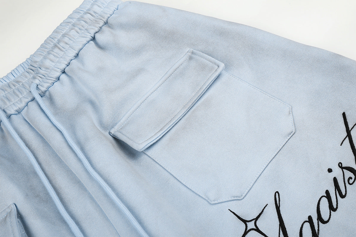 Pantalones de Chándal de Pierna Ancha con Estampado de Texto y Bolsillos Cargo