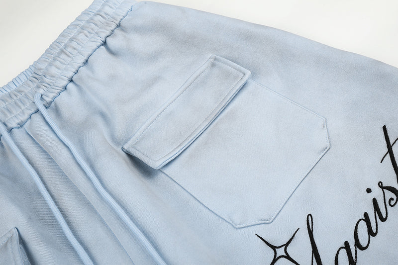 Pantalones de Chándal de Pierna Ancha con Estampado de Texto y Bolsillos Cargo