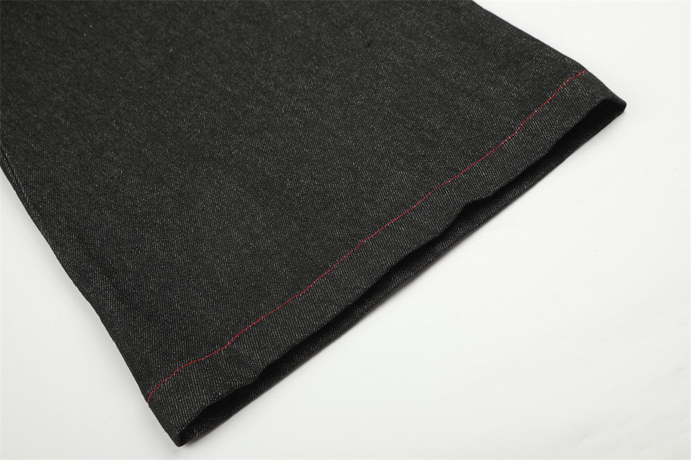 Schwarze Wide-Leg-Jeans mit Kunstfell-Kontrastbund und Nieten-Details