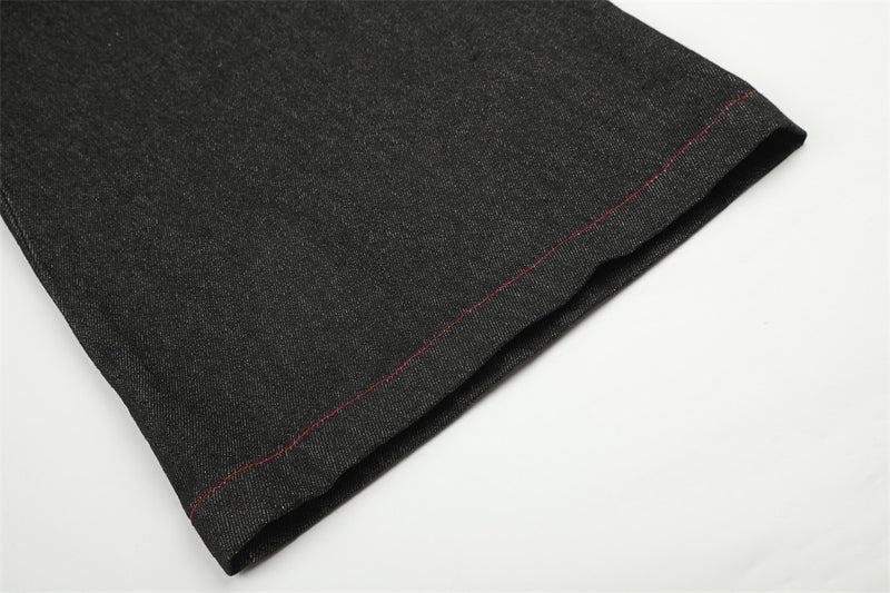 Schwarze Wide-Leg-Jeans mit Kunstfell-Kontrastbund und Nieten-Details