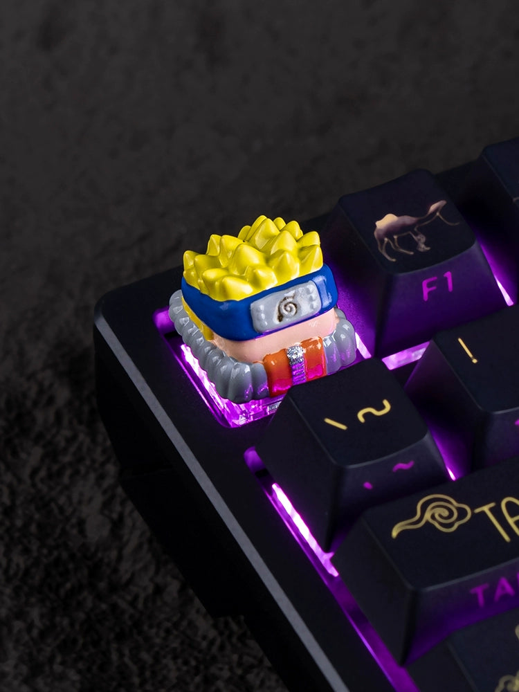 The Team 7 Naruto Keycap Set by Naruto features a custom resin Escape keycap depicting a character with spiky yellow hair and a blue headband. Enhanced with purple backlighting, this unique set is both vibrant and eye-catching.