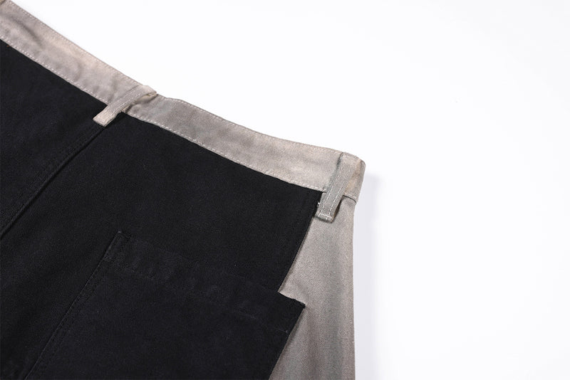 Wide-Leg-Patchworkhose – abstraktes Wellenmuster aus zweifarbigem, schwarz-grauem Washed-Denim