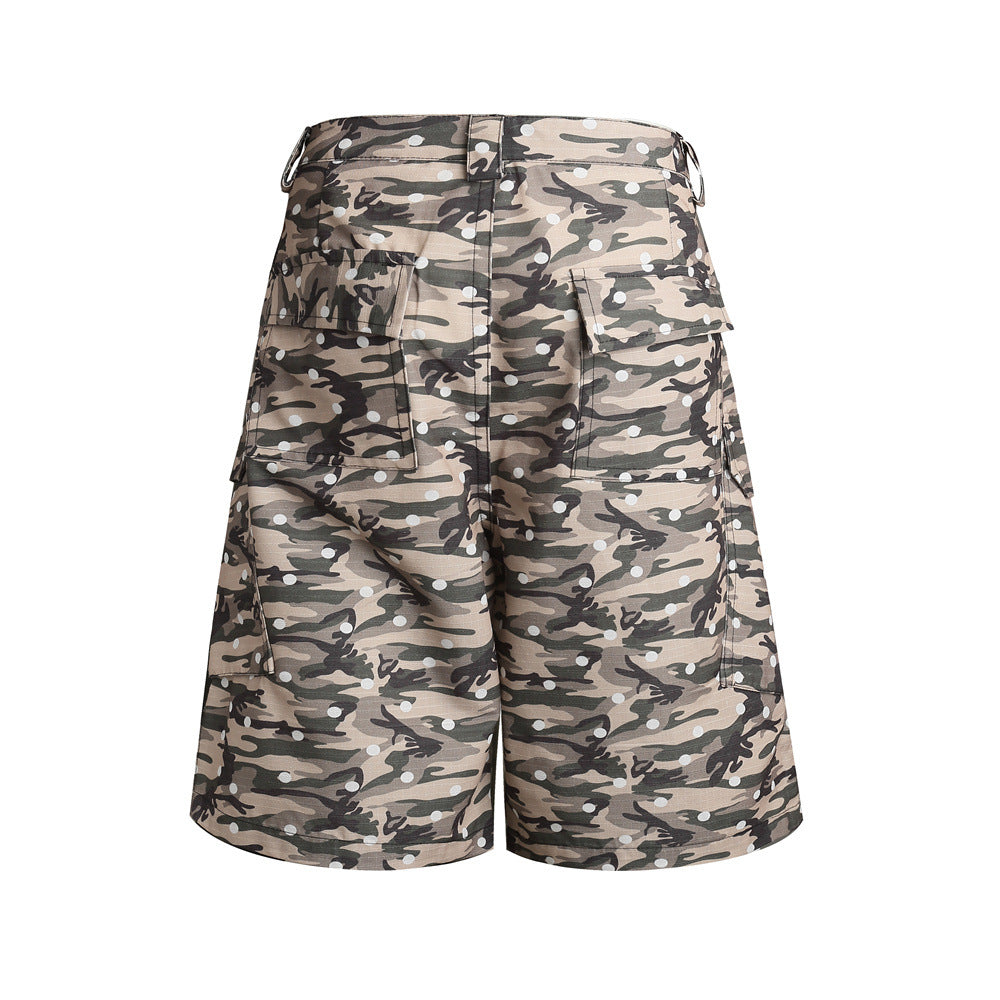 Front view of camo cargo shorts with wide legs, flap pockets, and button fly