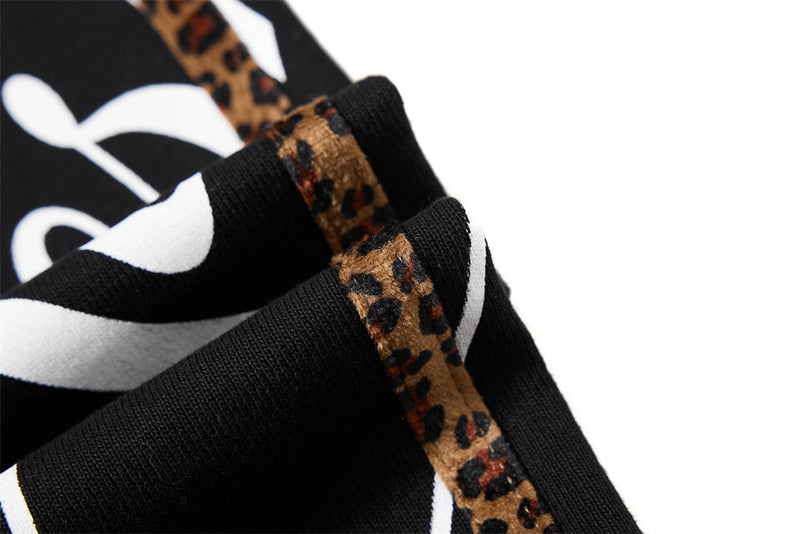 Dark Streetwear Wide-Leg Sweatpants with Leopard Side Tape & Script Print