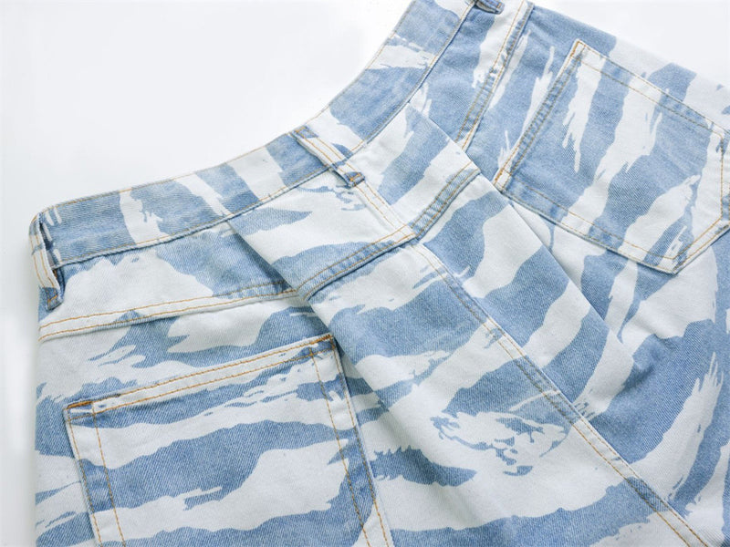 Close-up of back waistband and pockets on light blue zebra camo jeans