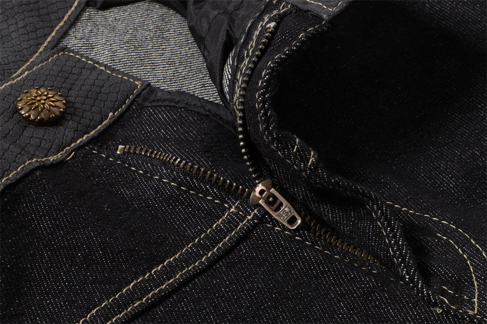 Close-up of the front zipper fly and button on black wide-leg jeans