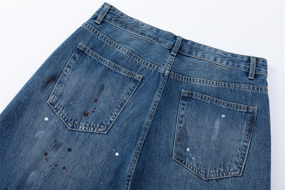 Wide-Leg Distressed Jeans with Paint Splatter & Ripped Knees – Vintage Punk