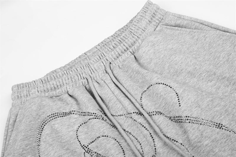 Pantalones de Chándal de Pierna Ancha con Texto de Strass – Corte Bombacho Extragrande con Cordón