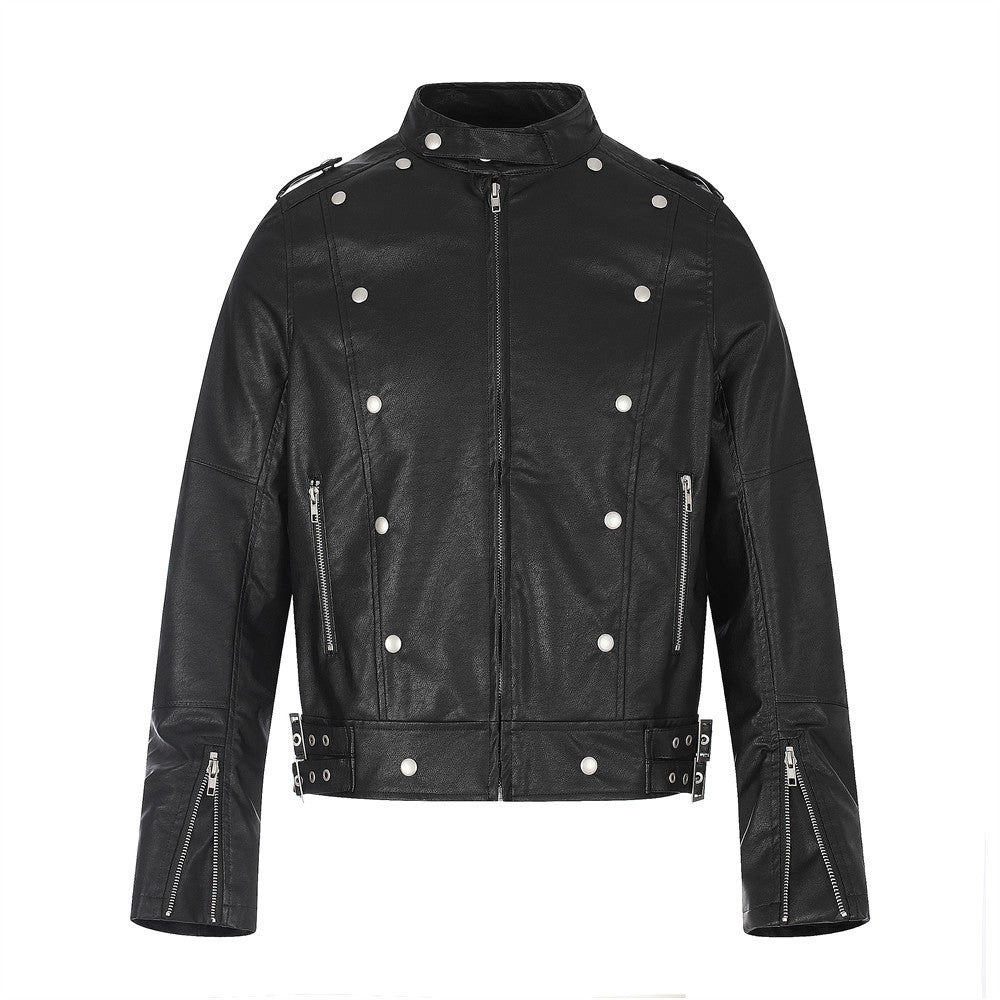 Men's black faux leather moto jacket with double-breasted silver studs, stand collar, zip cuffs, and buckle strap detail, fro