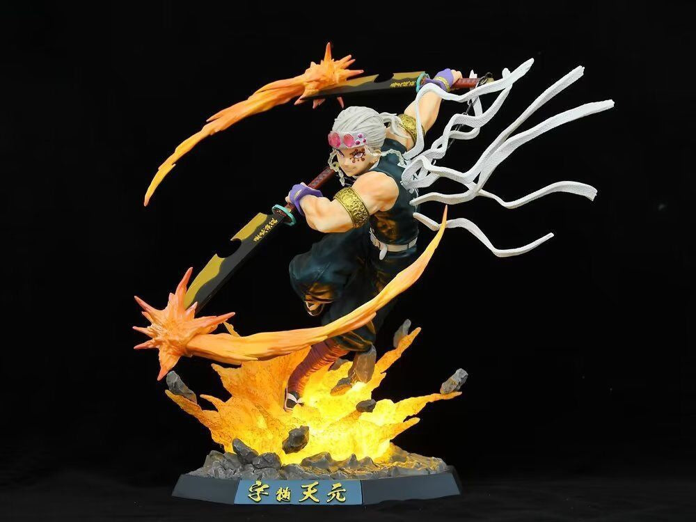 The Seakoff Premium Demon Slayer Urogi Figure stands 37cm tall, featuring intricate eyewear and a dynamic pose with two swords. It has USB light-up effects, showcasing fiery details against a dark background. The figure highlights Urogi&