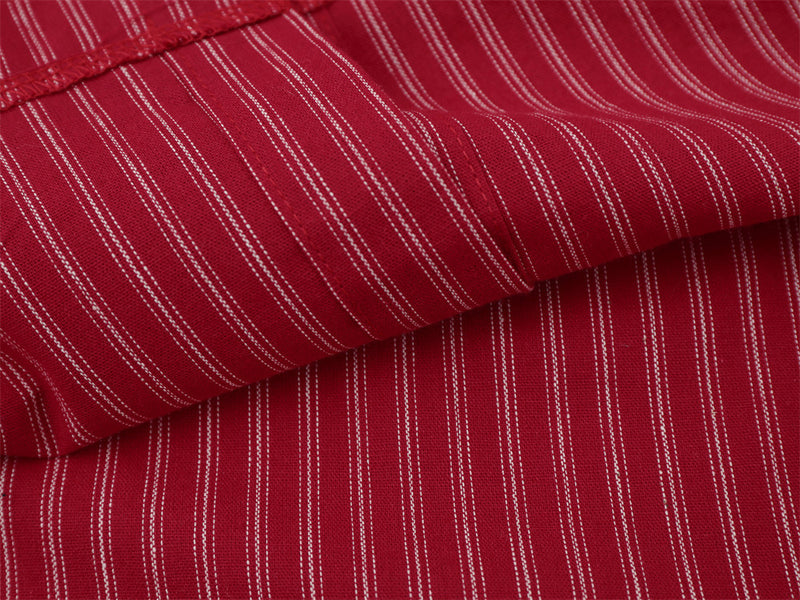 Close-up of red striped shirt sleeve fabric and seam detail