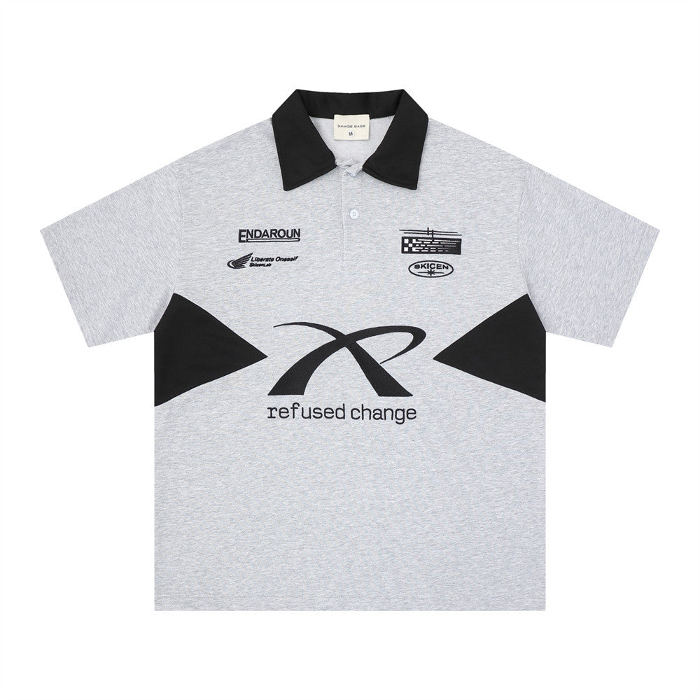 Oversized racing motorsport graphic polo shirt in heather grey with black colorblock panels and refused change front print