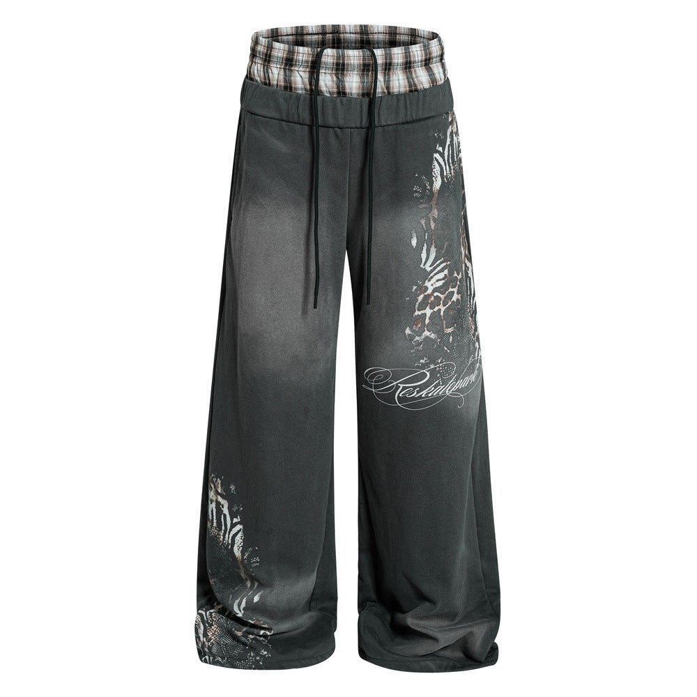 Men's wide leg washed charcoal sweatpants with plaid double waistband and animal print graphic on front leg