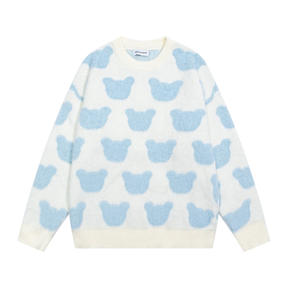 Oversized crewneck knit sweater with all-over bear-head jacquard pattern in cream with sky blue motifs
