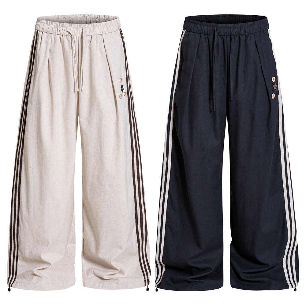 Pantalon de survêtement wide leg – Triple bande latérale, taille élastique à cordon