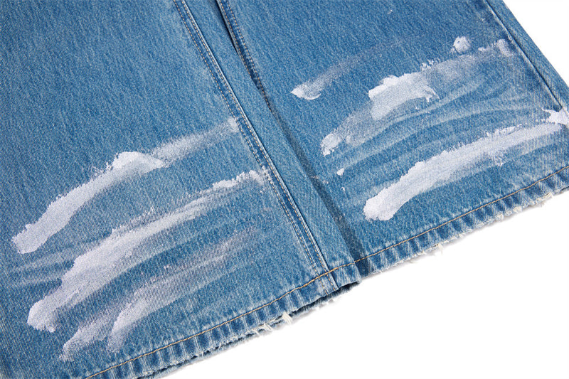 Distressed Flare Jeans – Men's Washed Blue Wide-Leg Denim with Paint Splatter