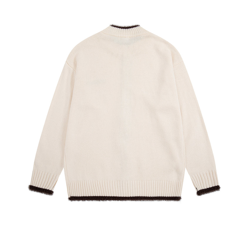 Gilet en maille zippé avec ornements cœur et étoile
