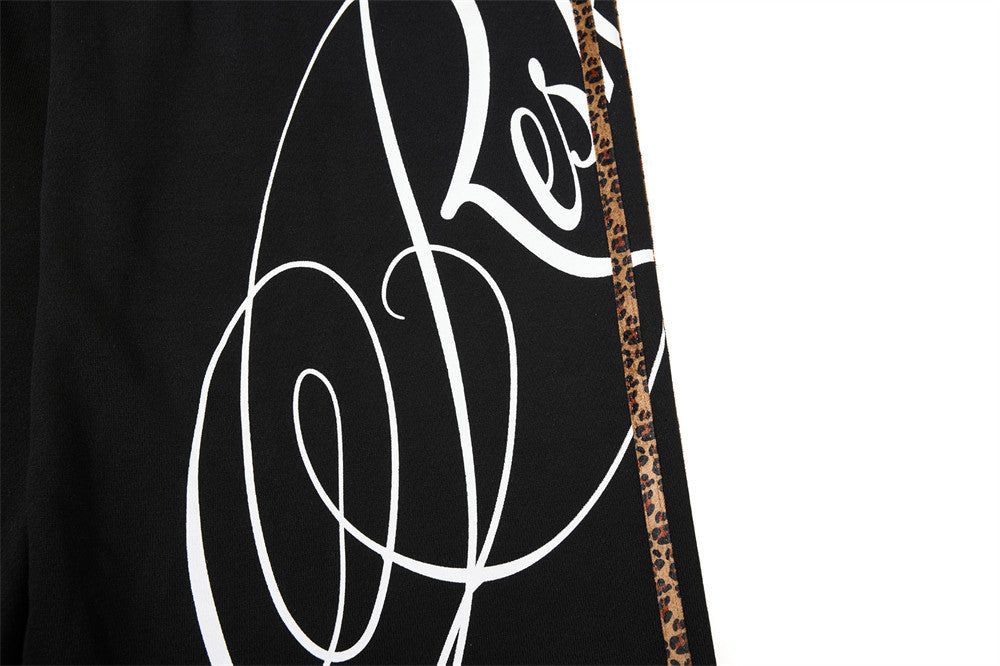 Dark Streetwear Wide-Leg Sweatpants with Leopard Side Tape & Script Print