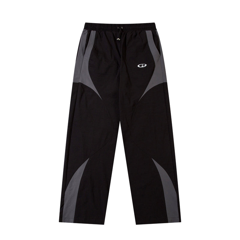Herren-Trackpants mit kontrastierender Paspel und Colorblock-Seiteneinsätzen