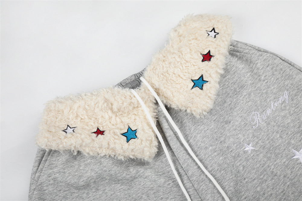 Sweatpants mit weitem Bein, Sternstickerei und umgeschlagenem Sherpa-Bund