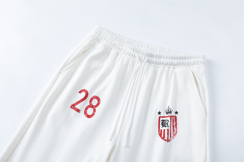 Pantalon de survêtement wide leg avec écusson varsity et motif graphique numéro 28