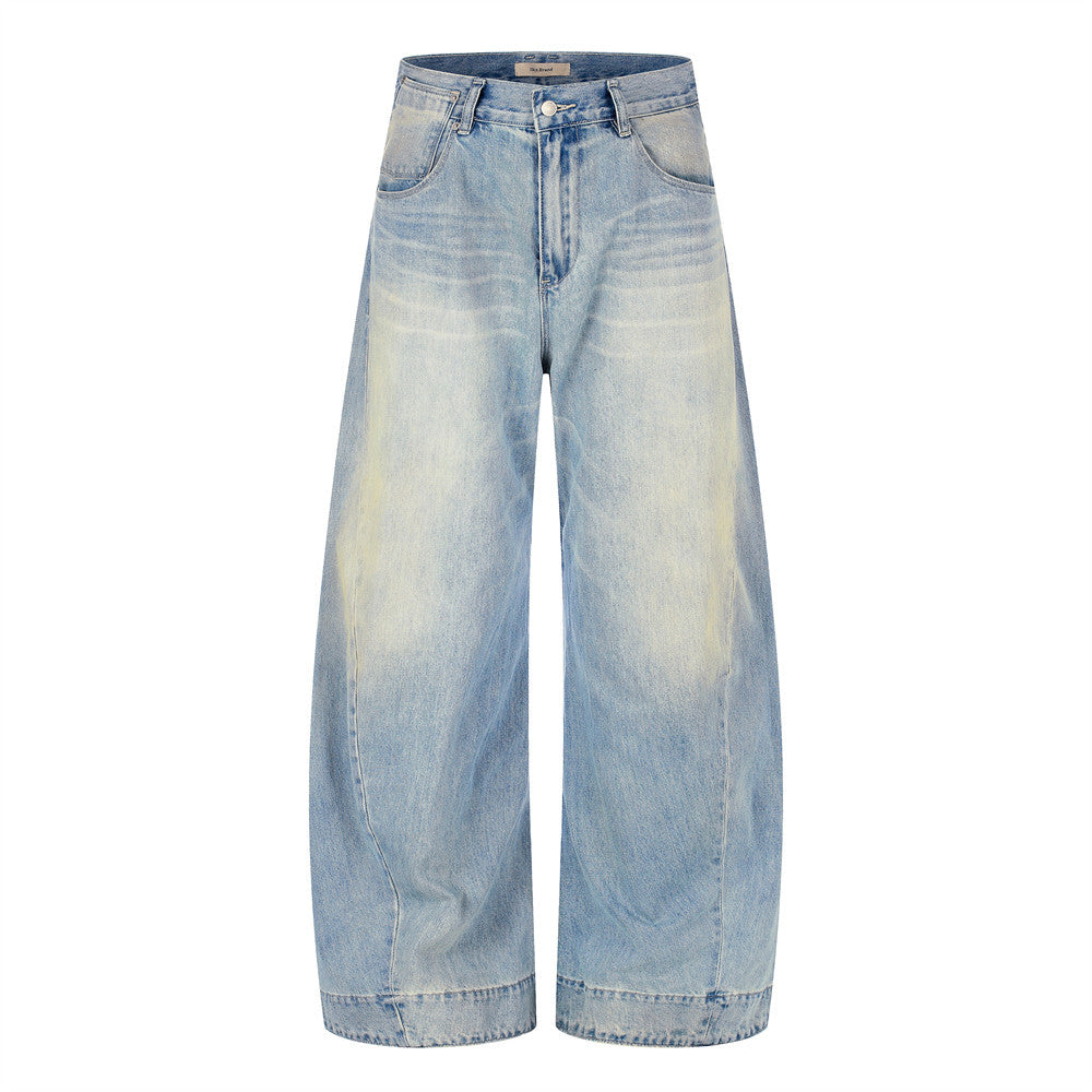 Vintage washed light blue barrel-leg wide-leg jeans with sun-faded detailing, front and back view