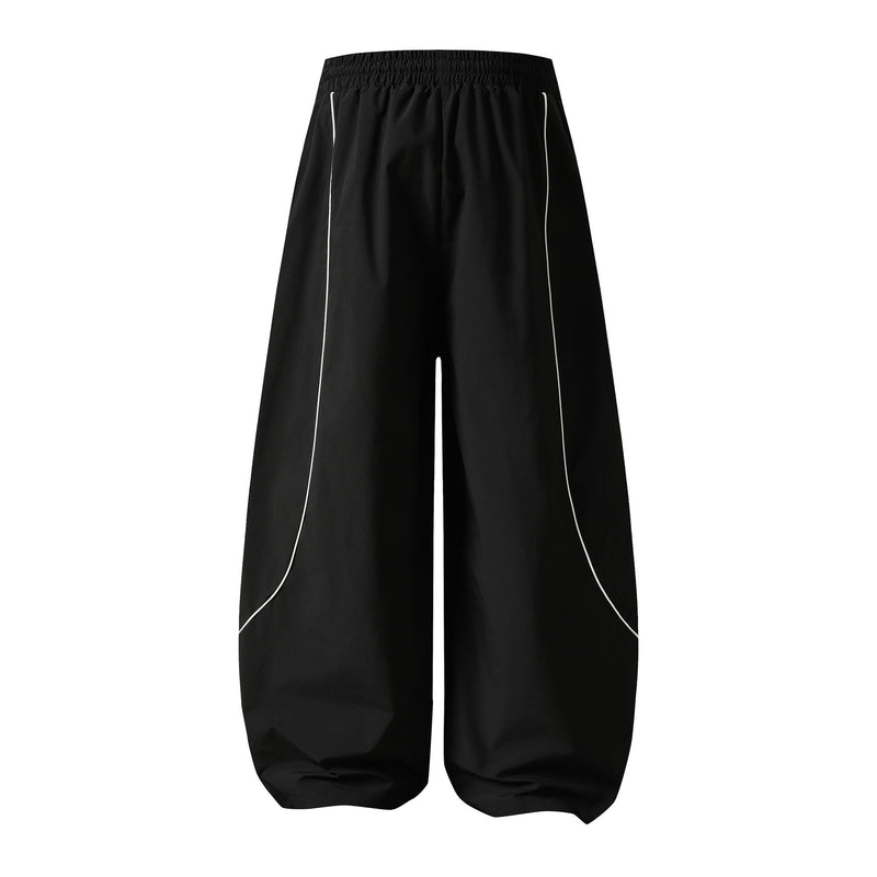 Herren-Trackpants mit kontrastierender Paspel und Colorblock-Seiteneinsätzen