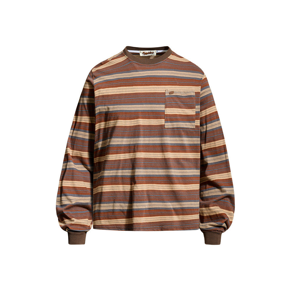 Men's oversized long-sleeve striped crewneck T-shirt with chest patch pocket in brown, rust, and slate blue horizontal stripe