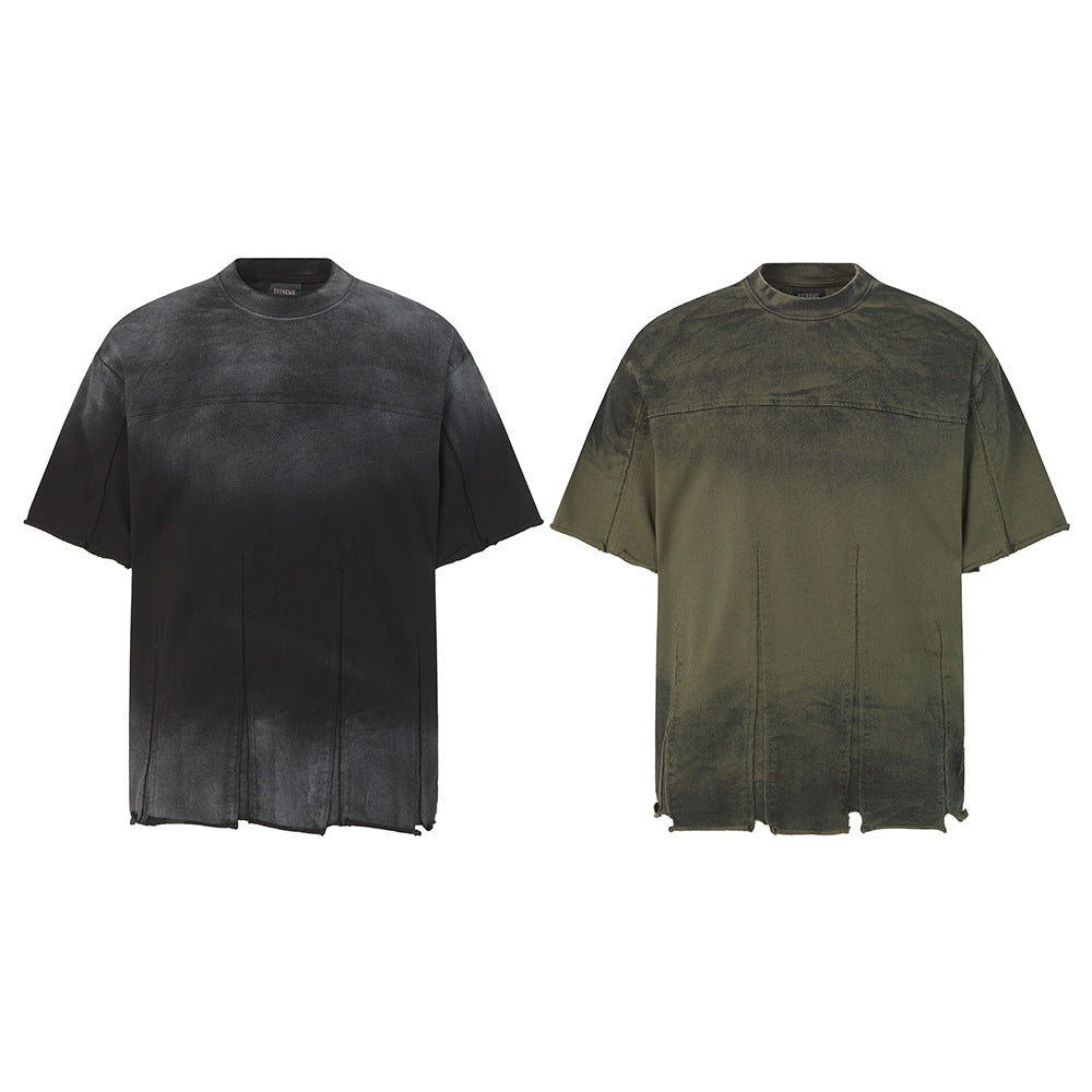 Oversized acid wash distressed t-shirt with raw edge hem and deconstructed seam paneling in washed black and army green