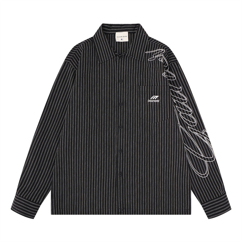 Oversized men's pinstripe long sleeve button-up shirt with script sleeve embroidery in black and red colorways