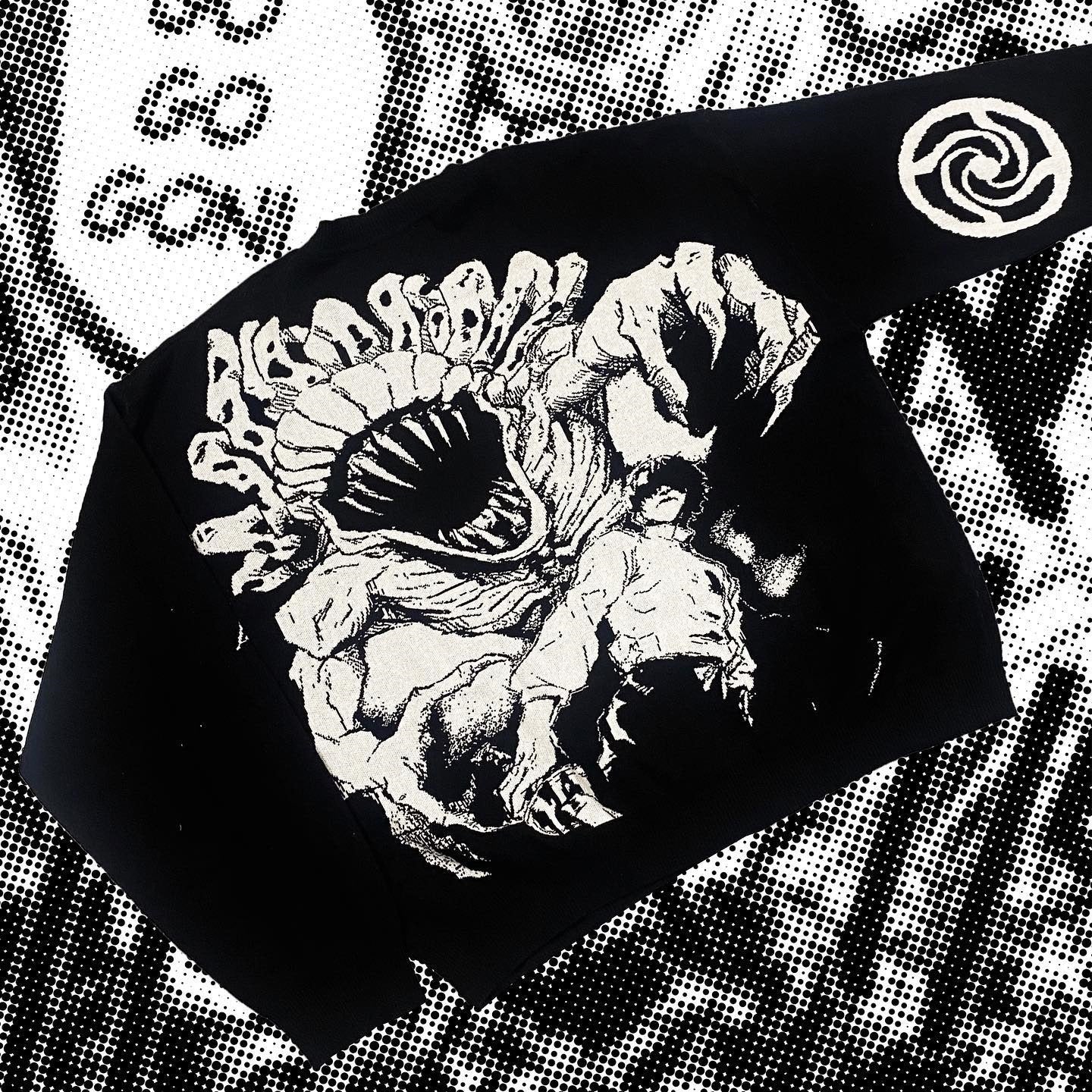 The Premium Yuta Okkotsu-Inspired Full Knit Sweater by Jujutsu Kaisen is streetwear in a loose fit with a monstrous creature graphic holding a man. It features a monochrome jacquard design, contrasting details, Yuta Okkotsu's circular logo on the sleeve, and a comic-style dotted pattern in the background.