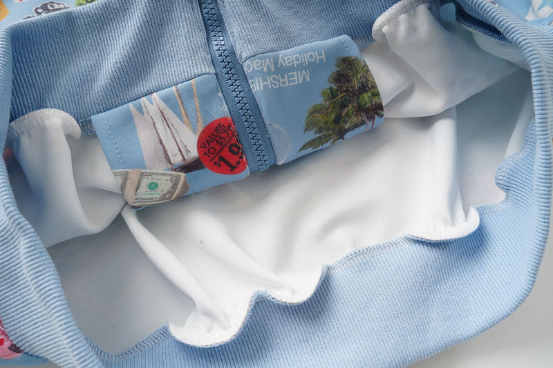 Sweat à capuche zippé court bleu clair à imprimé collage cartoon intégral