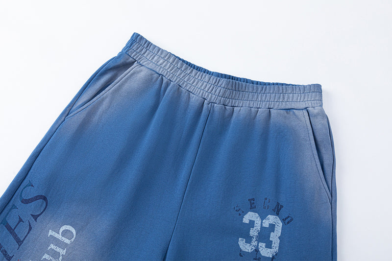 Pantalon de survêtement à jambes larges, imprimé graphique vintage effet acid-wash, coupe décontractée