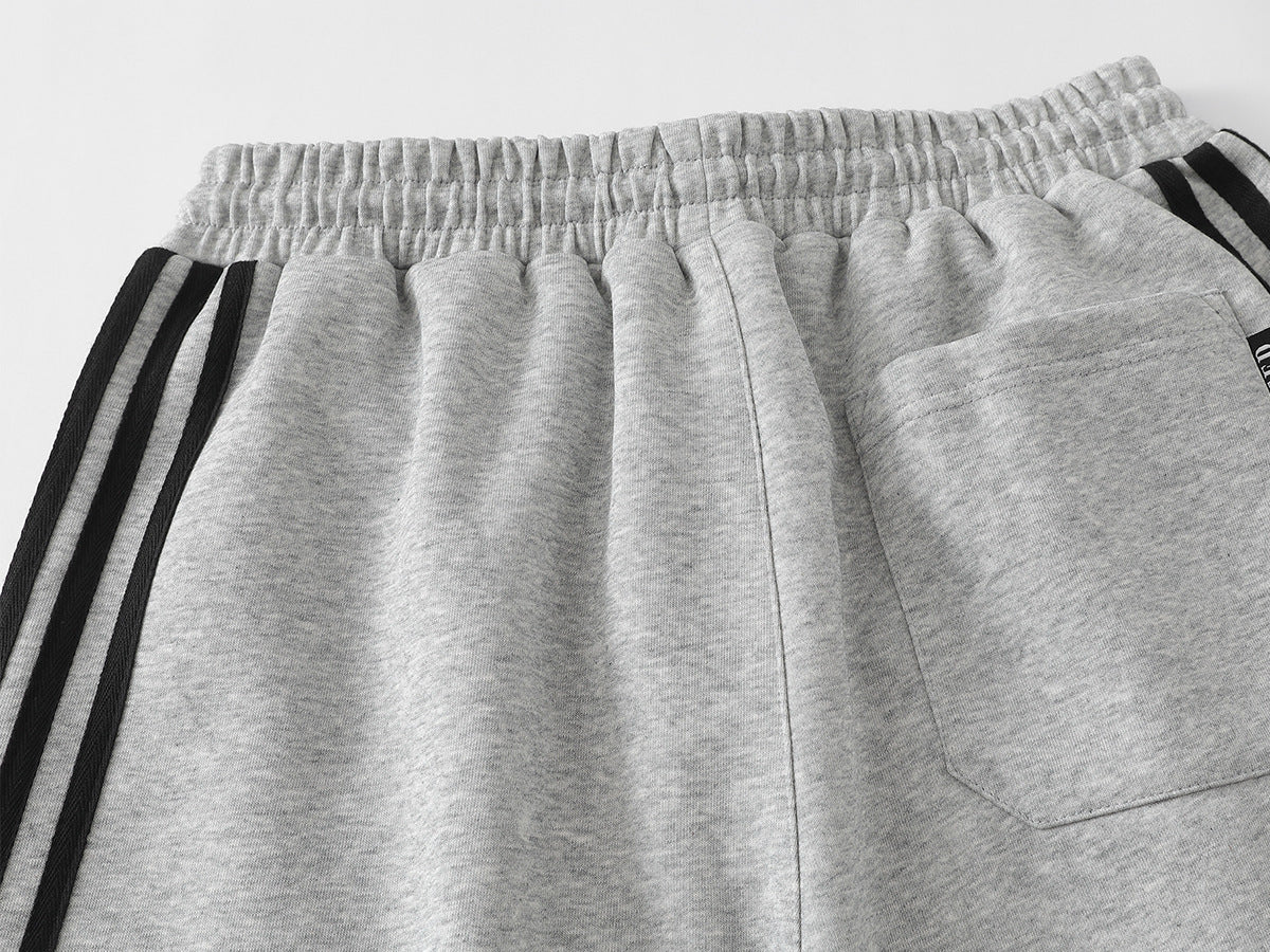 Pantalon de survêtement à jambes larges clouté d’étoiles 1996 avec détail à trois bandes
