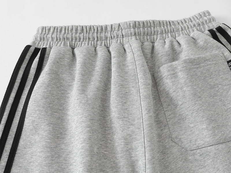 Pantalon de survêtement à jambes larges clouté d’étoiles 1996 avec détail à trois bandes