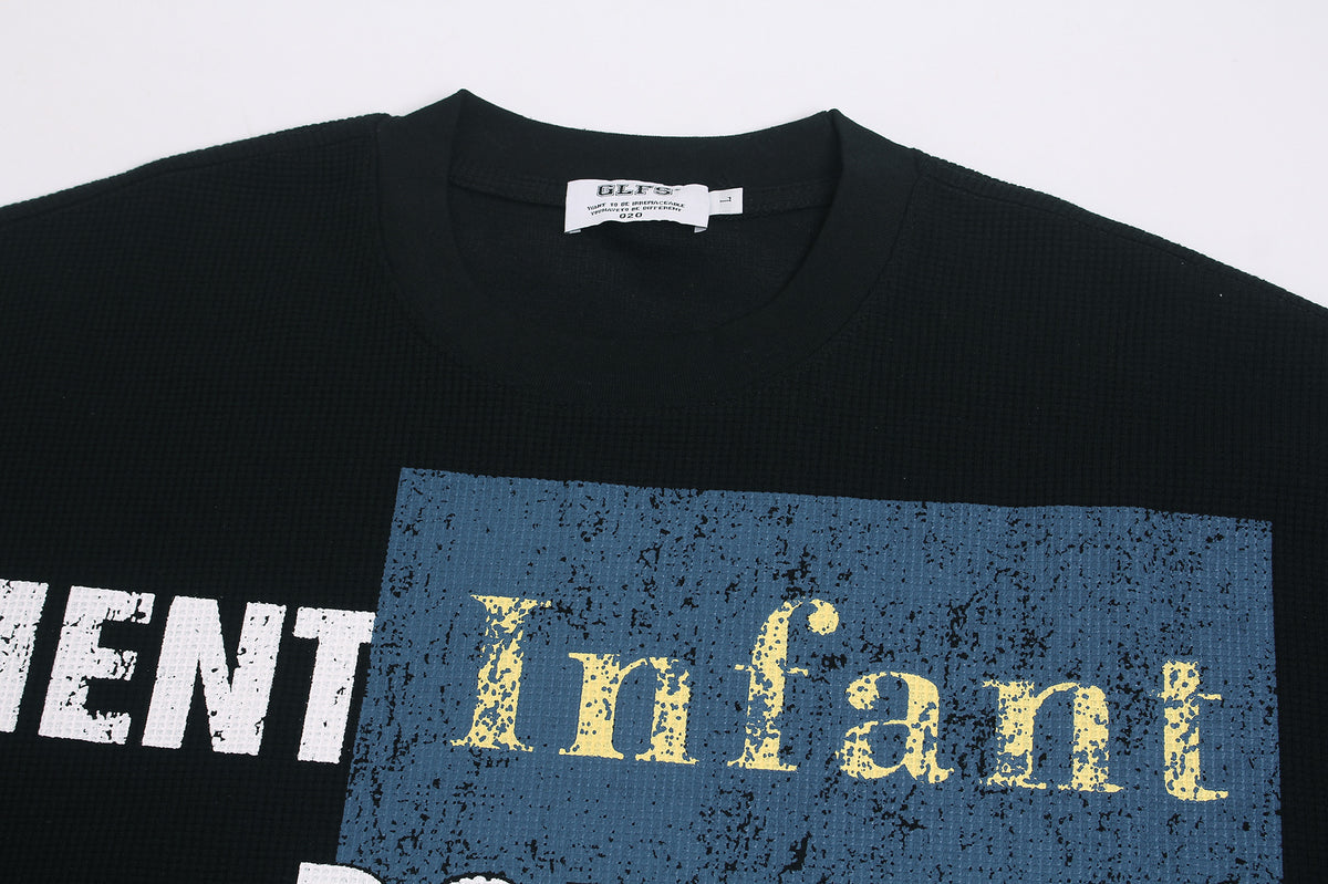 Schwarzes Longsleeve mit Graphic – Streetwear-Waffelshirt mit markantem Print