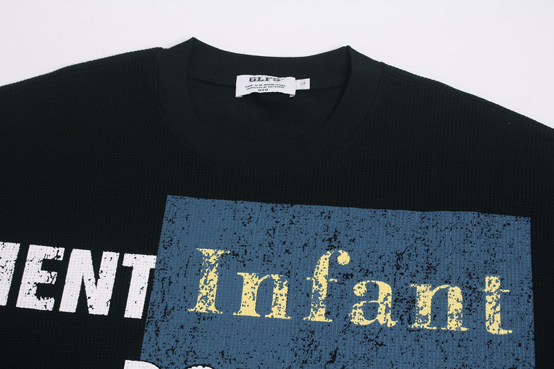 Schwarzes Longsleeve mit Graphic – Streetwear-Waffelshirt mit markantem Print