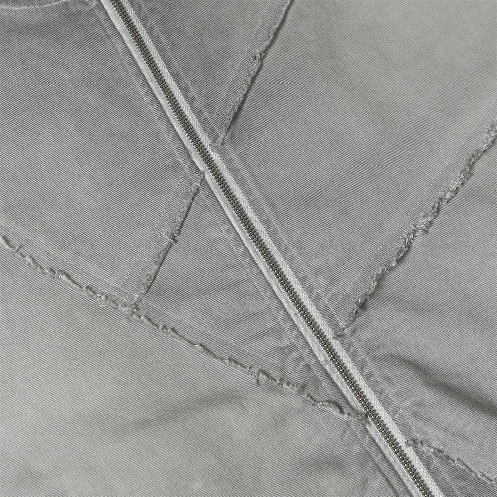 Blouson bomber déconstruit en patchwork – Toile délavée et coutures brutes