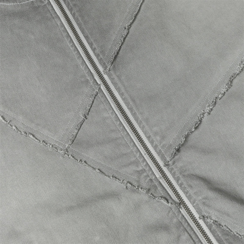 Blouson bomber déconstruit en patchwork – Toile délavée et coutures brutes